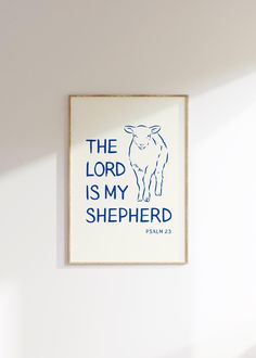 a blue and white print with the words, the lord is my shepherd on it