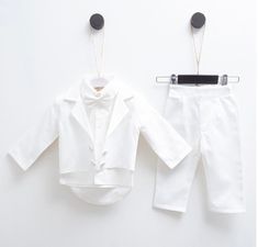 Classy and trendy boys outfit for your little man .We prepare each product with care and love for our work. *Baptism , christening or dedication outfit *Special event outfit *Long sleeve shirt and long pants.Pants has an elastic waisband Care instruaction Machine wash 65 to 85 F ( 30 degrees ) Elegant White Baptism Dress For First Birthday, White Elegant Baptism Dress For First Birthday, Cotton Baptism Sets, White Sets For Baptism In Spring, White Cotton Sets For Baptism, White Cotton Baptism Sets, White Spring Sets For First Communion, White Cotton Formal Sets, Baby Boy White Outfit