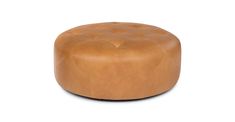 a brown leather stool with buttons on the top and bottom, sitting in front of a white background