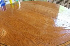 a wooden table that has been cleaned and is sitting in the middle of a room