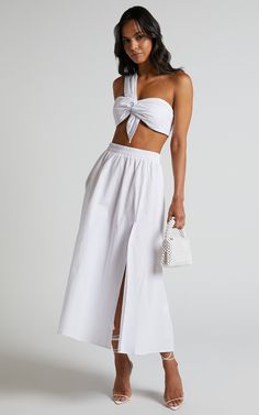 Sula Two Piece Set - One Shoulder Bralette Crop Top and Midi Skirt in White | Showpo USA Elegant Cropped Crop Top For Beach, Elegant Crop Top For Beach, Feminine Cropped Top For Vacation, Chic Cropped White Skirt, Cropped Skirt For Vacation, Chic Bandeau Crop Top For Brunch, Feminine Cropped Top For Brunch, Chic Cropped Crop Top For Daywear, Chic Cropped Bottoms For Daywear