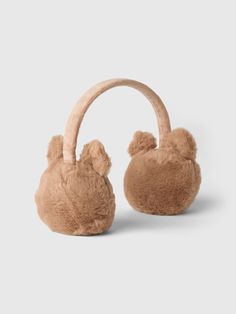 a brown teddy bear ear muffs on a white background