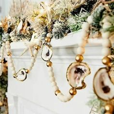 a mantle decorated with ornaments and greenery