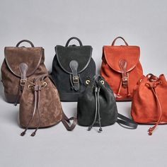 Espresso Suede Drawstring Backpack. Lund Leather. Made in the USA. Hand crafted leather drawstring backpack - made to last. Shop now! Casual Suede Travel Bags, Mini Drawstring Bag, Leather Drawstring Bags, Handmade Leather Tote, Drawstring Purse, Computer Books, Day Backpacks, Drawstring Bucket Bag, Leather Artisan