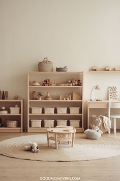 A minimalist children's playroom featuring wooden shelves filled with toys, natural storage baskets, and a small round table. Soft lighting and neutral colors create a warm and inviting atmosphere. Montessori Small Space, Montessori Playroom Small Space, Minimalist Montessori, Creative Playroom Ideas, Play Area Ideas, Kids Play Corner, Montessori Toddler Bedroom, Indoor Play Space, Montessori Playroom Ideas