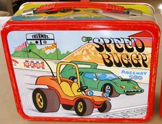 a lunch box with an image of a car and truck on it