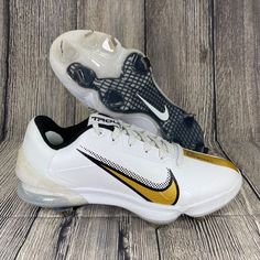 the nike air zoom low is white and gold