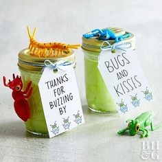 two jars with bugs and kisses in them, one has a tag that says thanks