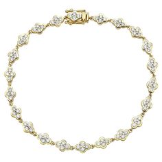 With this exquisite yellow gold bracelet, style and glamour are in the spotlight. This 18-karat bracelet is made from 9.1 grams of gold. This bracelet is adorned with VS2, G color diamonds, made out of 88 diamonds totaling 1.83 carats. The diamonds are arranged in a lovely clover shape, giving the bracelet a fashionable and glitzy appearance. This bracelet is 7 inches long. Luxury Jeweled Yellow Gold Bracelets, Luxury Yellow Gold Ornate Bracelets, Luxury Yellow Fine Jewelry Bracelets, Luxury Yellow Gold-plated Bracelets, Yellow Gold Star-shaped Bracelet For Gift, Modern Bracelets, Bracelet Style, Gold Armband, In The Spotlight