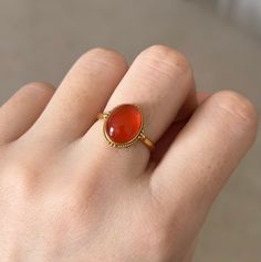 Refer pictures for more details  Can be used as ring or single use as a pendant  Comes with 18K gold ring band and a 18K gold necklace ! Yellow Gold Polished Moonstone Ring, Yellow Gold Carnelian Oval Cabochon Ring, Carnelian Yellow Gold Rings With Oval Cabochon, Yellow Gold Oval Cabochon Carnelian Rings, Gold Ruby Ring Oval Cabochon With Polished Finish, Formal Gold Carnelian Ring, Formal Carnelian Gold Ring, Yellow Gold Ruby Ring With Oval Cabochon, Fine Jewelry Cabochon Ruby Ring In Yellow Gold