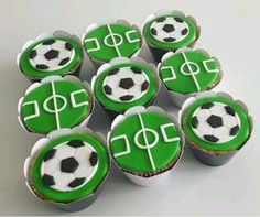 cupcakes with soccer balls on them are arranged in the shape of letters and numbers