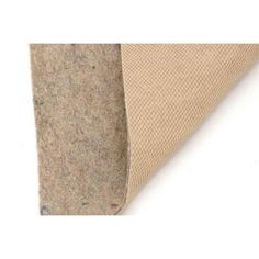 a roll of beige fabric on top of a white surface with the bottom rolled up