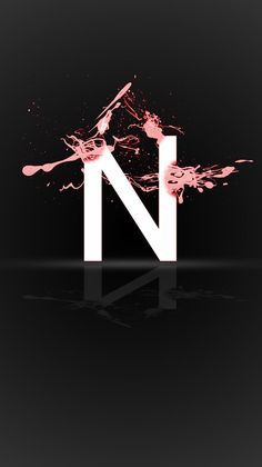 the letter n is made up of pink and black paint on a black background with reflections