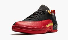 The Air Jordan 12 Low “Super Bowl LV” is a special edition colorway of Michael Jordan’s twelfth signature shoe in a colorway dedicated to the biggest sporting event of the year.  Released by Jordan Brand in February 2021 ahead of Super Bowl LV (55), which was held in Tampa, Florida, this low-top Jordan 12 displays several football references in its design, beginning with the Vince Lombardi Trophy inspired gold accenting on the mid-panel and confetti-style pattern on the liner.  The rest of the l Jordan 12 Low, Black And Gold Shoes, Jordan Retro 12, Low Top Jordans, Air Jordan 12, Lv Shoes, Air Jordan 12 Retro, Exclusive Sneakers, Jordan 12 Retro