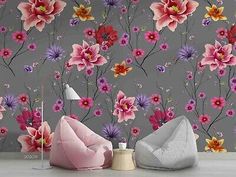 the wallpaper is very colorful and has pink flowers on it, as well as grey walls