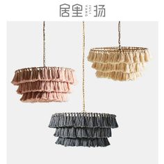 three different types of chandeliers hanging from chains with chinese characters in the background