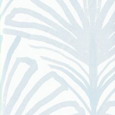 a blue and white wallpaper with a palm leaf pattern on the back in shades of light blue