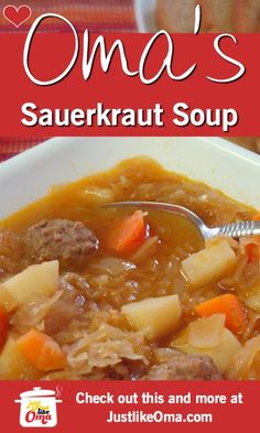 a bowl of soup with carrots and potatoes in it, on a red table cloth