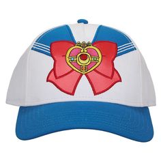 the hat is white and blue with a red ribbon around it's brim