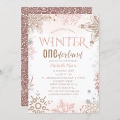 a pink and gold snowflake winter onederland birthday party card on a marble surface