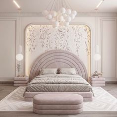 a large bed sitting in the middle of a bedroom next to a chandelier