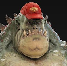 a close up of a person wearing a baseball cap with an animal like creature on it's face