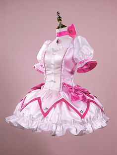 This price includes a dress, a bowknot choker, a pair of bowknot hairclips, 2 bowknots on the waist, a pair of gloves, and a pair of socks.  Embrace the kawaii aesthetic and sweet Lolita fashion with this intricately designed dress, perfect for cosplay events, conventions, and themed parties. Channel your inner magical girl and capture the essence of Madoka's character with this enchanting ensemble.   	 		 			Size 			S 			M 			L 			XL 		 		 			Shoulders 			36 			38 			40 			42 		 		 			Bust 			8 Madoka Magica Outfits, Madoka Kaname Aesthetic, Madoka Kaname Cosplay, Magical Girls Outfit, Christmas Dress Aesthetic, Magical Girl Outfit Ideas, Madoka Magica Cosplay, Magical Outfits, Madoka Cosplay