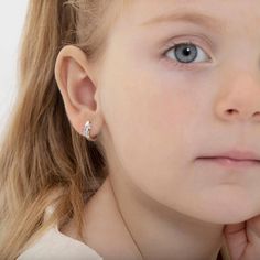 Delightful and dainty, these sparkling unicorn hoop earrings for girls are just her fairy-tale style. Crafted in 925 sterling silver with pink enamel, this abstract unicorn is simply lovely. Buffed to a brilliant luster, this magical figure is perfect for little girls. Gift box included. Age Group: Cute for Little Girls or Pre Teens; Safe for Sensitive Ears 925 Sterling Silver Hoop Size: Inner Diameter (8mm); 0.39 in. Outer Diameter (12mm) Unicorn Size: (6mm W x 7mm H) Metal Stamp: 925 Gift Box Unicorn Jewelry, Gold Earrings Models, Unicorn Kids, Earrings For Girls, Kids Earrings, Magical Unicorn, Pink Enamel, Girls Gift, Simply Lovely