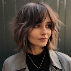 Textured Shaggy Bob with Side Swept Bangs scaled Shag Bob With Bangs Straight Hair, Choppy Bob Side Bangs, Rocker Messy Fringe, Sharp Bob With Bangs, Medium Bob Side Part, Short Hair With Bangs Side Part, French Shaggy Bob, A Line Bob With Side Bangs, Shaggy Bob With Bangs Round Faces