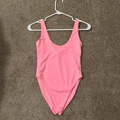 Purchased From Forever 21 Brand Name Hot & Delicious Size Small Light Pink One Piece Bikini That Can Be Worn As A Top As Well Bodysuit Double Lined Completely Sold Out So Get It Here! Solid One-piece Beach Leotard, Summer Swimming Bodysuit With Lined Body, Pink Stretch One-piece For Summer, Solid Summer Leotard For Swimming, Backless Leotard With Lined Body For The Beach, Pink Stretch Bodysuit For Sunbathing, Pink Stretch One-piece For Sunbathing, Solid Color One-piece Swimsuit For Spring, Solid Color One Piece For Spring Swimming