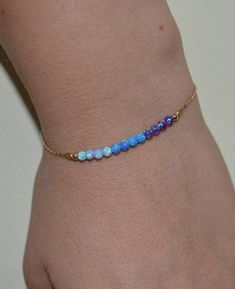 Elegant 14k Gold Filled bracelet with opal beads bar. This gorgeous piece of jewelry is perfect for a variety of outfits and occasions. M a t e r i a l s Your bracelet can be made of the following materials: Sterling Silver or 14k Gold Filled. Please select material during checkout process. M e a s u r e m e n t s - Available bracelet lengths: 6, 6.5, 7, 7.5, 8 inches - The length of the entire bracelet is measured from end to end - Model on the pics wears 7 inches bracelet P a c k a g i n g You Elegant Adjustable Opal Beaded Bracelets, Elegant Opal Beaded Bracelets With Round Beads, Gold Bracelet Simple, Jewelry Opal, Bead Bar, Bracelet Simple, Bar Bracelet, Opal Bracelet, Bar Bracelets