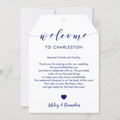 a white and blue wedding welcome card