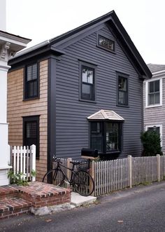 a bicycle is parked in front of a house