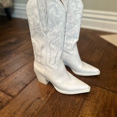 Dagget Boot Jeffrey Campbell Western Cowboy /Cowgirl Boots White Size 6.5. I'm Normally A True Size 7 But Sometimes Boots Run Larger So I Purchased A 6 1/2 Based On Other Reviews I Felt These Ran A Little Larger Than Usual As Well. 6 1/2 Fit Perfect But It's Seven Would've Been Fine Too. Just For Reference... Leather Upper With Rubber Sole Side Pull-On Tabs Tonal Western Embroidery Along Shaft Snip Toe Stacked Heel Heel Measures Approx 2.5" H Shaft Measures Approx 12" H Imported Revolve Style No. Jcam-Wz1160 Manufacturer Style No. Dagget I Had Purchased These New On Revolve Website. There Are A Few Minor Scuffs As Shown In Pics , But Overall In Excellent Used Cowgirl Boots White, Western Embroidery, Revolve Style, Boots White, Cowboy Cowgirl, Jeffrey Campbell Shoes, Cowboy And Cowgirl, Cowgirl Boots, Western Cowboy