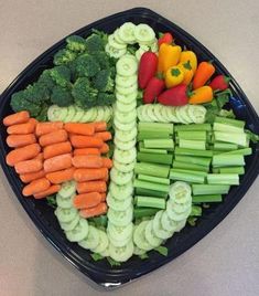 a plate filled with vegetables on top of a table