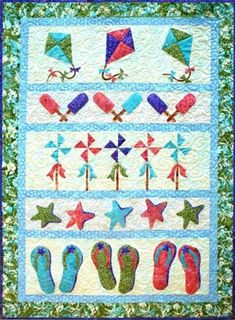 a quilted wall hanging with flip flops, kites and stars on it