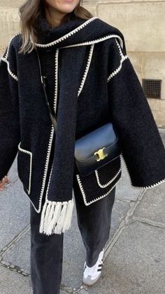 Current Fall 2023 Fashion Trends - Timeless Toteme Scarf Panel Coat  A woman wearing a Toteme Draped wool scarf panel jacket styled with black jeans and a black leather shoulder bag. Fall Aesthetic 2023, Look 80s, Jackets Fashion Casual, Aesthetic Fit, Sundress Casual, Scarf Jacket