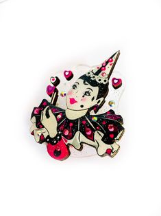 Jazz up your outfit with this brooch by Rosie Rose Parker! This stunning Pierrot clown brooch is a quirky and playful addition to any fashion ensemble. Featuring an intricate design with star acrylics and hand-placed gems, this French-themed brooch is sure to turn heads. Measures 6cm x 5cm and made with wood, resin, and glitter acrylics. Ooh la la! Pink Brooch Pins For Party, Pink Party Brooch Pins, Unique Pink Brooches For Party, Unique Party Brooch Pins, Star Acrylics, Pierrot Clown, Novelty Handbags, Acrylic Bracelet, Bone China Tea Set