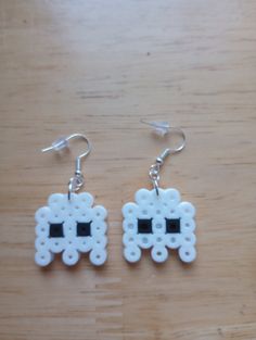 the earrings are made out of legos