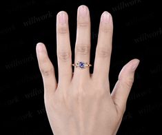 - Metal: Solid gold(10K/14K/18K white/yellow/rose gold),925 sterling silver,platinum available- Main Stone: 5mm round cut natural Tanzanite.- Accent Stone: round cut natural sapphires (Silver ring with lab sapphires).- Can be personalized: Yes Star Sapphire Ring Vintage, Sapphire Ring Vintage, Gemstone Jewelry Earrings, Sapphire Silver Ring, Wedding Ring Women, Unique Wedding Ring, Star Sapphire Ring, Tanzanite Engagement Ring, Star Sapphire