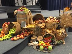 an assortment of fruits and vegetables on display