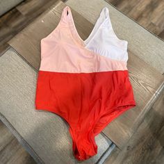 This Is A Super Cute Color Block Swimsuit From Cupshe. Bright Orange/Coral, Pink/Peach, White. Never Worn. Spring Beach Bodysuit With Color Block, Summer Color Block Bodysuit For Vacation, Pink Stretch Bodysuit For Sunbathing, Spring Beach Bodysuit In Color Block, Pink Bodysuit For Beach Season With Lined Body, Pink Lined Bodysuit For Beach Season, Pink Bodysuit With Lined Body For Beach Season, Spring Beach Color Block Bodysuit, Pink Summer Bodysuit With Lined Body