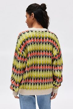 Vintage-inspired OBEY sweater in a slouchy, cardigan style. Designed in a multi-color printed knit with a v-neckline, drop shoulder long sleeves and a button-up front. Topped with contrast, ribbed-knit trim. Features OBEY Granny cardigan Slouchy cardigan Multi-color printed knit Contrast ribbed trim throughout V-neckline with drop shoulders and long sleeves Button-up front Oversized, relaxed fit Tunic length Button closure Content + Care 100% Acrylic Machine wash Imported Size + Fit Model in Green Multi is 5’7" and wearing size Small Measurements taken from size Small Chest: 40" Length: 25" | OBEY Granny Cardigan in Green, Women's at Urban Outfitters Trendy Oversized V-neck Sweater For Spring, Casual V-neck Jacquard Knit Cardigan, Trendy Multicolor V-neck Sweater, Multicolor Knit V-neck Cardigan, Fall V-neck Sweater, Fall Acrylic V-neck Sweater, Oversized Jacquard Knit Cardigan, Multicolor Jacquard Knit Cardigan For Spring, Spring Multicolor Jacquard Knit Cardigan