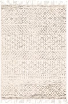 a white rug with fringes on the bottom and an area rug in the middle