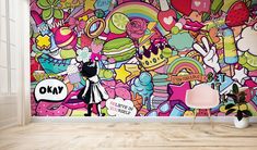 a colorful wall mural in an empty room