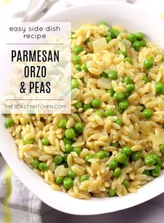 pasta with peas and parmesan in a white bowl on top of a table