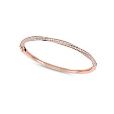 The Swirl Diamond Bangle represents the epitome of sophistication and luxury, beautifully blending classic charm with a contemporary twist. The bangle's graceful swirl design adds a touch of uniqueness and romance to your wrist with an array of diamond accents that are meticulously set in a delicate micro-pave setting. It is perfect for stacking with other diamond-cut bracelets or bangles, allowing you to create your own unique and personalized jewelry combinations. Cut Bracelets, Jewelry Combinations, Father's Day Specials, Pave Setting, Diamond Bangle, Swirl Design, Bracelet Bangle, Diamond Pendant Necklace, Micro Pave