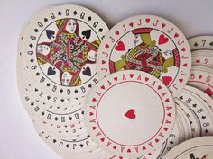 several playing cards are stacked on top of each other