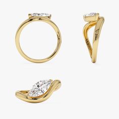 three pieces of gold jewelry including an engagement ring, and a pear shaped diamond