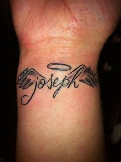 a wrist tattoo with the word joseph on it